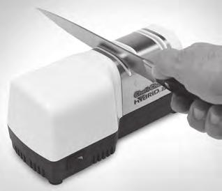STAGE 1 To sharpen, place the sharpener on the table gripping it securely with your left hand. Push on the power switch.