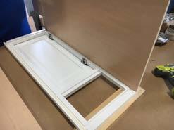 Insert a cabinet side into the dado channel, ensuring that dado channels on the side and face frame align.