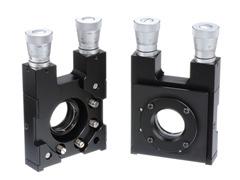 Kinematic mounts are often used for adjustment of element tilt. These are used for adjustment of mirror itself, but it is difficult for small lens system like a camera.