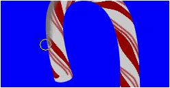Because there is a clipping path, the shadow region will only appear on the candy cane. Try to keep the brush about 50% on the candy cane and 50% off.