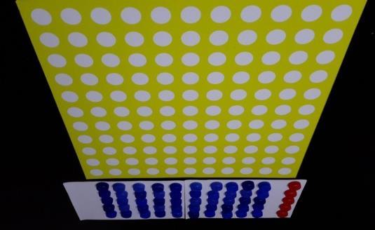 These 5-hundred red caps are separated. 5 red caps are 5x10 = 50 blue ten caps.