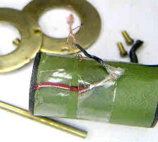 The photo at right shows the coil assembly, which. besides being badly frayed, one of the wires is connected to the wrong place.