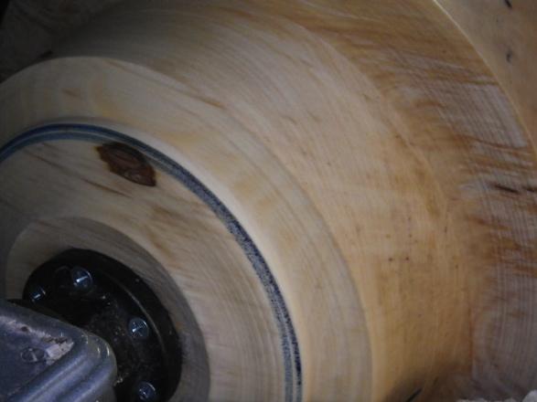 The reason the cut is as smooth as it can be is because the fibers in the wood are being cut in such a way that the underlying fiber is supporting the fiber that is being cut.