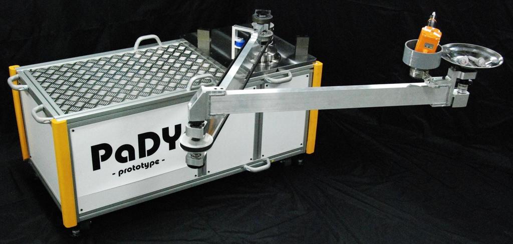 The First Prototype of PaDY (P1) Size:(W)1370 (D)590 (H)1035[mm] Link Mechanism :Horizontal ArEculated Robot Maximum Reach:2.