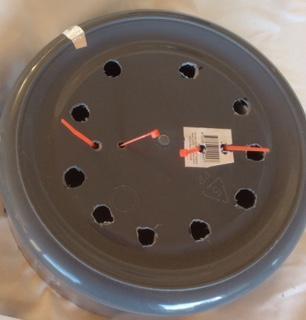 Thread each cable tie through the inner hole of the lid, then loop it back into the other hole in the bucket bottom. Here 20.
