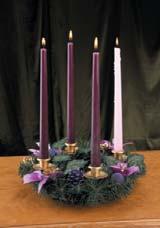 traditional centerpiece of the Christmas season. Most often, each wreath holds four candles, lit progressively during Advent.
