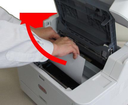Remove any jammed paper from the top cover.