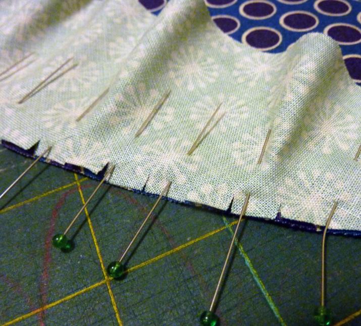 You may need to remove a few pins and readjust as you go to make sure it is pinned evenly and the ends match.
