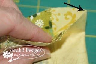 4. To create the box pleats, first fold the inner pleat fabric in half width-wise and finger press a mark.