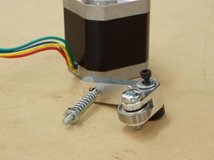 Use the M3 20MM to attach the extruder arm assembly to the motor.
