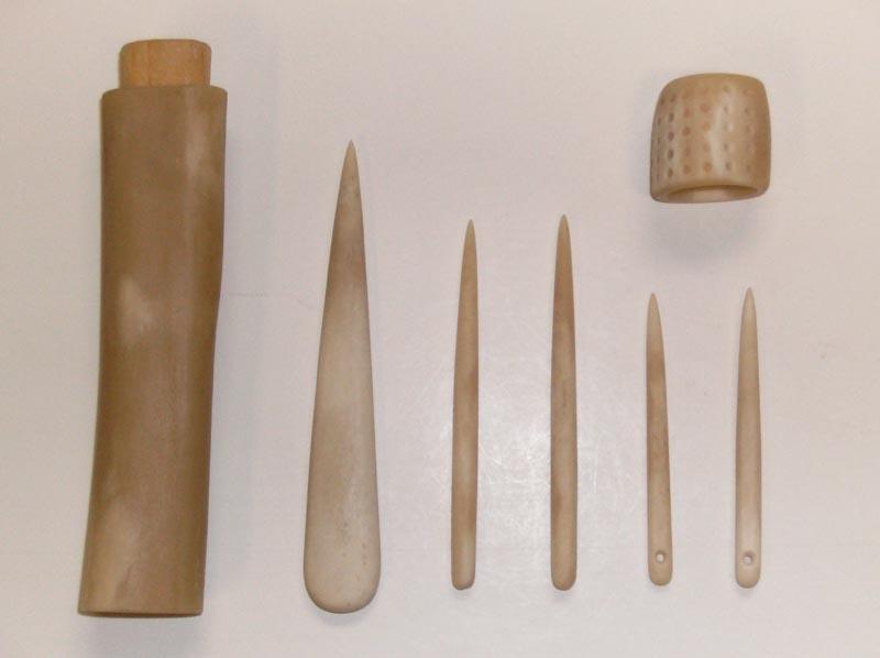 Bone tool set including awl, two pins, two