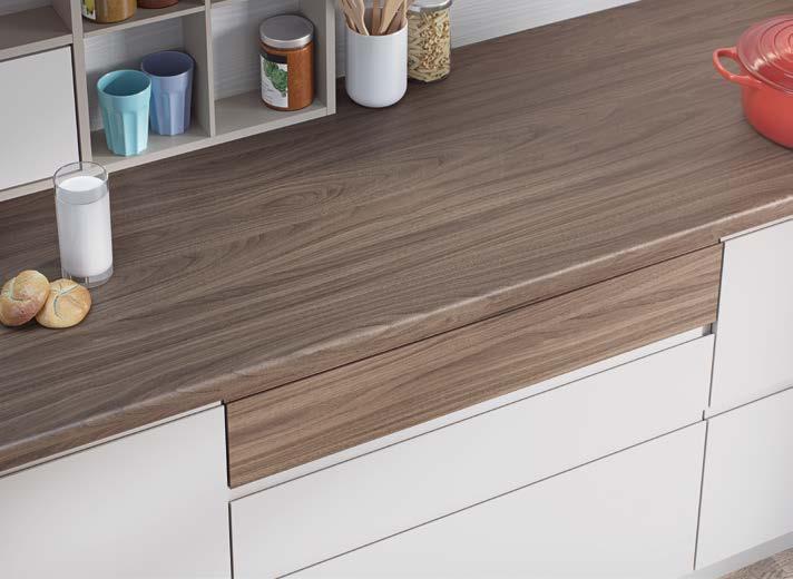 Creative design ideas Worktop & drawer front: H3710 ST9, Natural Carini Walnut Connecting rooms With the continued growth of open-plan living it is important to make sure furniture in one room either