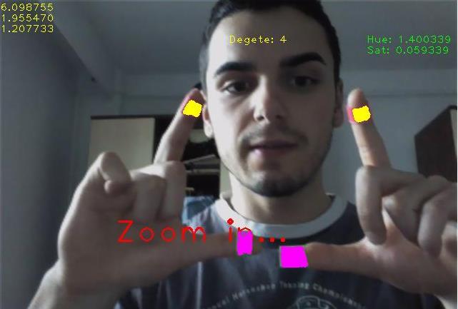 Detectia si interpretarea gesturilor bazata pe makere de culoare Starea 2 Sunt neceare 4 degete: 2 degete avand marker rosu, iar 2 degete cu marker verde Se va calcula distanta euclidiana intre