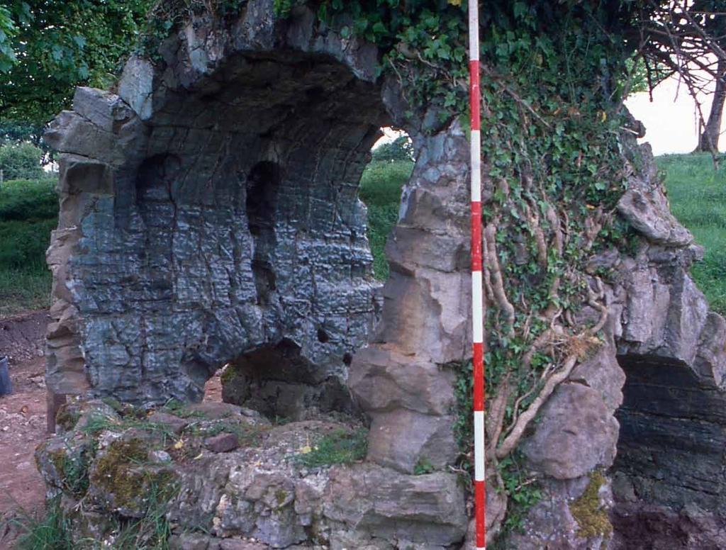 The stoke-hole (or ash-raking hole) is the arch to the right at the end of the furnace. The sides of the furnace have collapsed, to reveal the siege platform within.