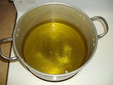 Put your oils, butters and fats into the pot (the smaller one) but leave the lid off.