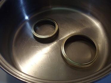 Fill your larger pot with about 2 inches of water from the tap and set it on the stove.