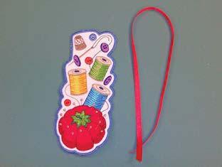 5. Add a decorative tassel to the bookmark using one of