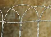 Specification A-11 (Double Loop) fence has closely woven picket wires at the bottom, and double-loop wires that prevent climbing.