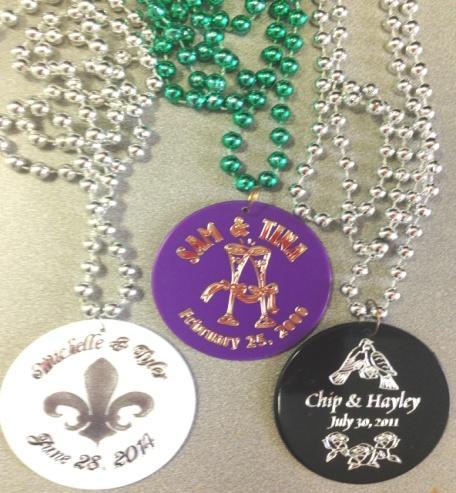 00 each MEDALLION BEADS Foil Imprinted Price includes 1 color foil imprint on 1 side of a 2 1/2" plastic disc attached to a 7 mm 33 bead. Die Charge: $60.00 Reorder Set Up: $30.