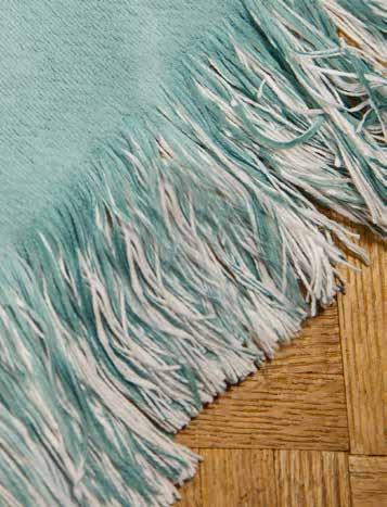 curl up on the edges. Colors pop on this fluffy woven surface. Woven and printed in the U.S.A.