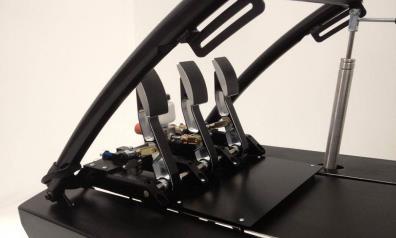 The cockpit incorporates a worlds first variable driving position, which allows the user to pre select what type of car they are driving and then rotate and lock the cockpit to the correct driving
