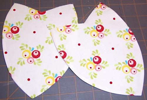 Leave the top edge open. 3. Trim seam allowance to ¼" and turn the pocket right side out. Press flat. 4. Repeat to create the second pocket. 5. The upper edge of the pocket is finished with bias tape.