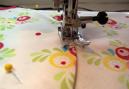 You can shift position slightly as needed to match the pattern on the pockets with the pattern on the apron front.