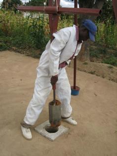 Each time the auger is filled with soil, it is raised and
