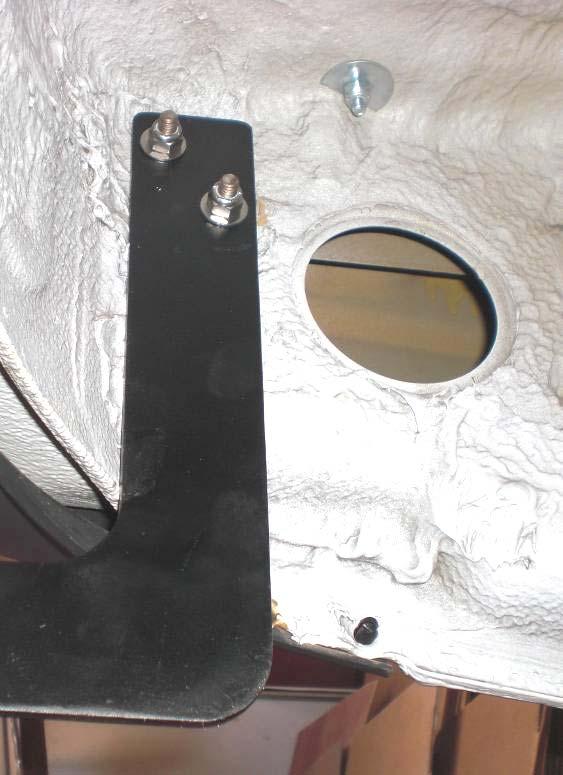 Figure 6: Bent mounting bracket and backing plate 4. Insert the four 7/16 bolts (#70183) through the holes in the frame with a washer on each side and install a locking nylon nut on each 5.
