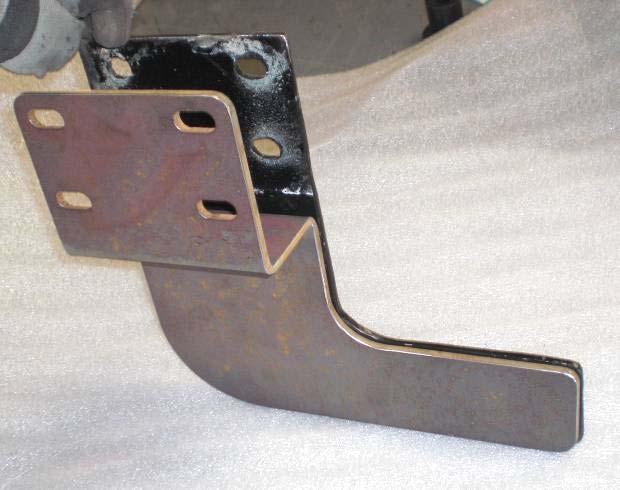 the mounting plate that does not line up with the four holes on the frame) Support Bracket Installation 6.