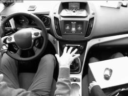 and tracking under real environmental and build-in conditions. Figure 3: Camera head of ToF prototype camera (left), hand gesture interaction within the car (right) 2.