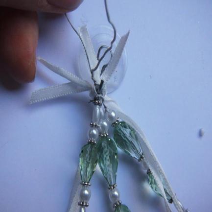 Cut the ends off the wire and fold them down to make sure there are no sharp edges and this will complete the beaded