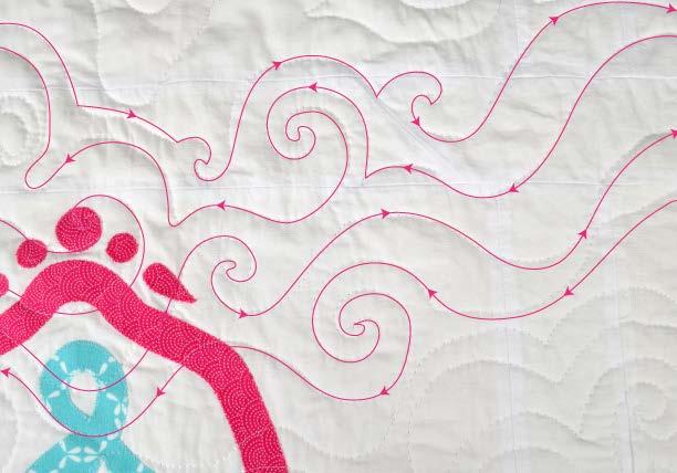 Then take safety pins and pin through all three layers of the quilt, spaced about 5-6 apart.