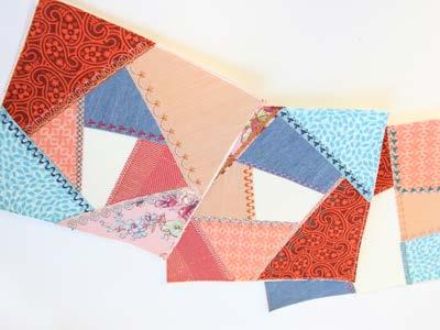 Use the in-the-hoop crazy quilt blocks to create unique looks using your scrap fabric stash! Assemble the blocks as instructed above.