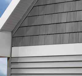 Board transition from lap siding to gable accent.
