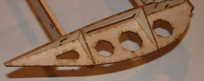 Put these in place on the wing tips as shown in the second image, making sure they are pressed fully into place and secure them to the wing with thin CA. 24.