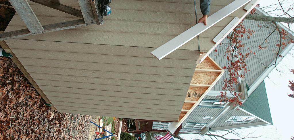 Trim the rake first; then install the fascia after the roof framing Framing and trim go on together. After I establish solid staging (see FHB #160, pp.