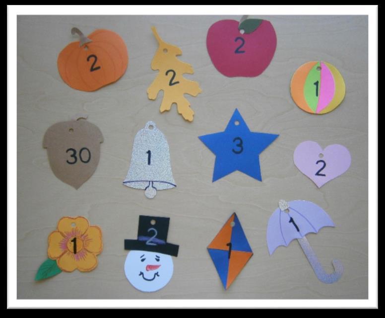 (35 nails or hooks needed) Cut out shapes for each month: January snowflake or party hat February hearts March