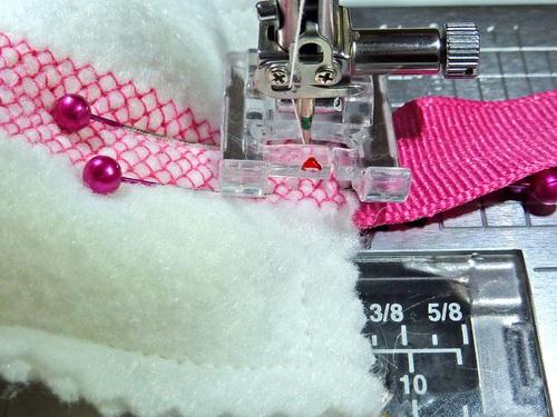 Re-thread the machine with thread to best match the narrow ribbon in the