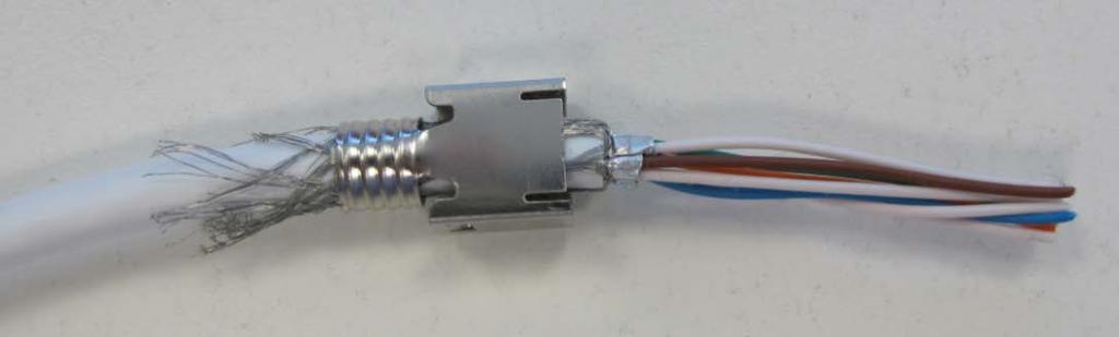 Slide the plug shield over the cable jacket and cable shield (if present).