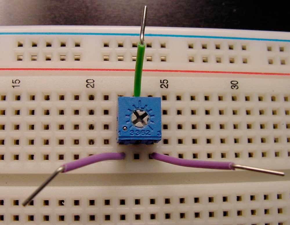 Laboratory page of 5 The pot is shown below inserted into the breadboard so that each pin occupies a different column.