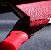 Pull the corner excess diagonally and use the broad knife to position the fabric against the outside corner edges.
