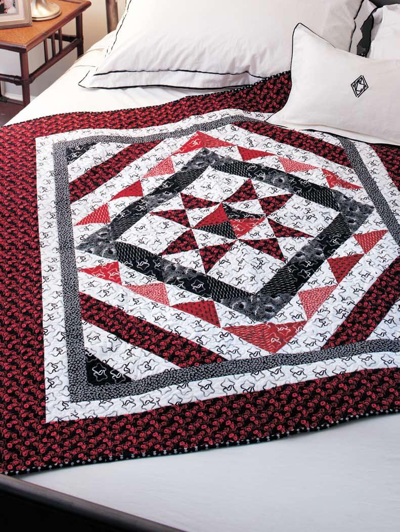This striking throw features the popular black, white, and red color scheme.