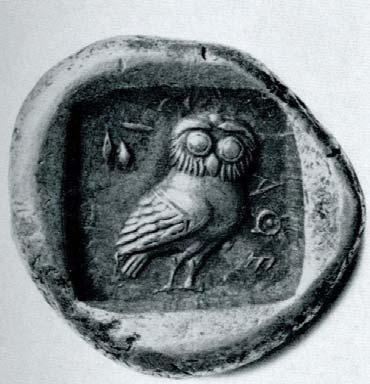 Figure 6. An early Athenian Owl (Franke and Hirmer 1964, 117). Some coins were very primitive, with variations in weight, different depictions of Athena and the owl, with different details.