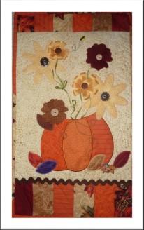 You can use the easy to use Embroidery CD to complete this panel or if you do not have an embroidery machine, you can still complete this darling door panel using your decorative stitches on your