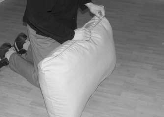 the back cushion by striking it on the