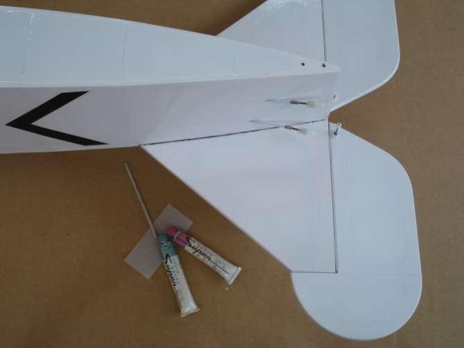 and secure the horizontal onto the tail of the fuselage.