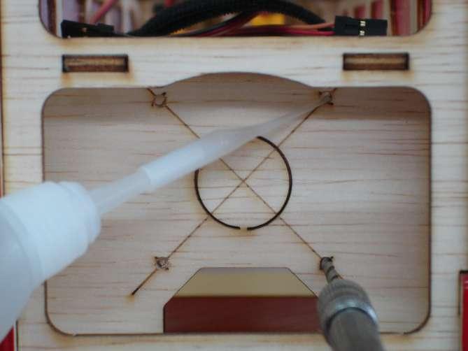 Use hobby knife to cut off the center circle hole on the fire wall.