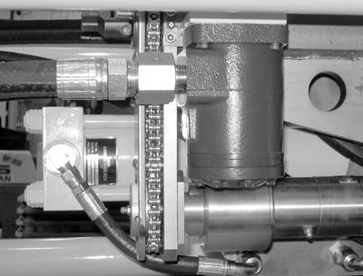Figure 6-5. Grease the upper feed screw bushing fitting. 6. Grease the feed gearbox fitting on the feed motor.