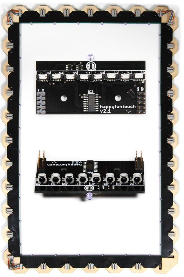 Figure 4 Modular implementation of point-to-point visual hull sensing. Each module offers one additional perspective through the onboard LED, and 8 infrared sensors. Modules are shown at actual size.